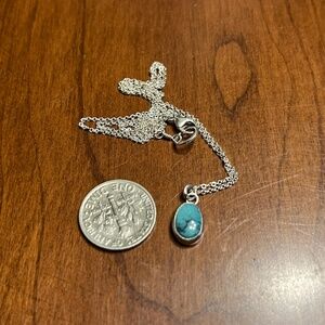 Dainty sterling silver turquoise pendant.